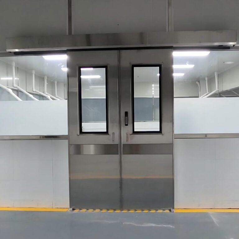 Stainless steel automatic hermetic sliding doors installed in cleanroom factory environment